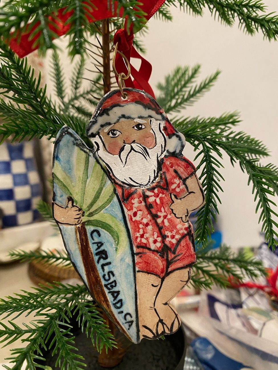 Carlsbad surfing Santa ornament